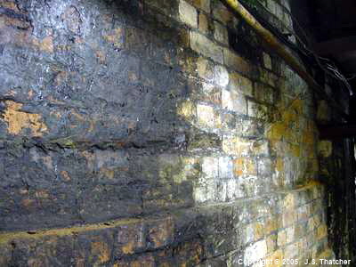 Groove from an old drum rim on LH wall of North winder drum pit